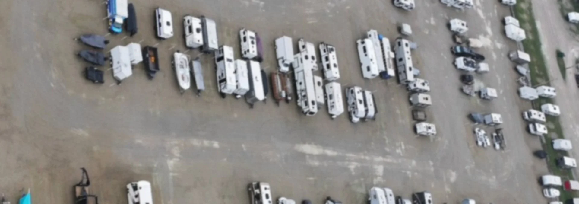 Aerial view of the Big River storage lot, full of parked RVs and boats